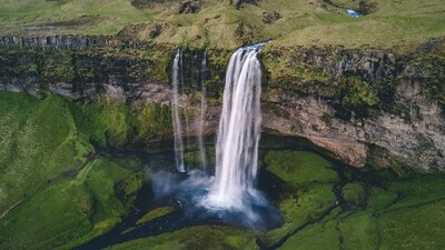 Seljalandsfoss, Iceland: Seljalandsfoss is a stunning waterfall located on the south coast of Iceland. It is unique in that visitors can walk behind the waterfall and enjoy the view from a different perspective. (Unsplash) Seljalandsfoss, Iceland: Seljalandsfoss is a stunning waterfall located on the south coast of Iceland. It is unique in that visitors can walk behind the waterfall and enjoy the view from a different perspective. (Unsplash)