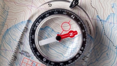 Navigation Tools: It is essential to have navigation tools such as a map and a compass to help you stay on track and navigate your way through unfamiliar terrain. (Unsplash) Navigation Tools: It is essential to have navigation tools such as a map and a compass to help you stay on track and navigate your way through unfamiliar terrain. (Unsplash)