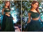 Rakul Preet, an avid social media user, never fails to impress her fans and fashion gurus with her impeccable wardrobe picks. From traditional Indian wear to fancy gowns, the Runway 34 actor knows how to pull off any look effortlessly. For a recent family wedding, she kept it bling in a green contemporary lehenga set.&nbsp;&nbsp;