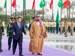 Saudi Crown Prince Mohammed Bin Salman welcomes Chinese President Xi Jinping in Riyadh, Saudi Arabia.