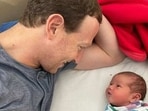 Facebook co-founder Mark Zuckerberg with his daughter Aurelia Chan.