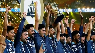 Gujarat Titans squad celebrates with the IPL trophy (ANI/File Photo) Gujarat Titans squad celebrates with the IPL trophy (ANI/File Photo)
