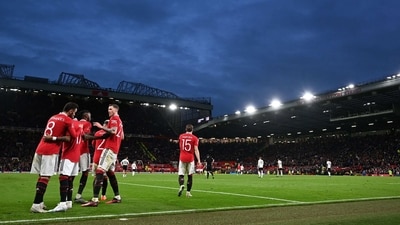 Manchester United celebrate a goal. (AFP)