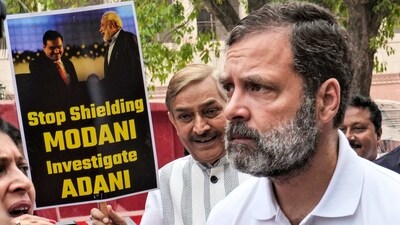 Congress leader Rahul Gandhi with Rajya Sabha MP Pramod Tiwari (PTI) Congress leader Rahul Gandhi with Rajya Sabha MP Pramod Tiwari (PTI)