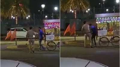 Screengrabs of video that shows UP cop slapping the street vendor. (Twitter) Screengrabs of video that shows UP cop slapping the street vendor. (Twitter)