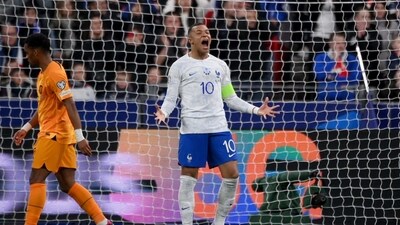 France's forward Kylian Mbappe celebrates after scoring his team's third goal during the UEFA Euro 2024 qualification football match (AFP) France's forward Kylian Mbappe celebrates after scoring his team's third goal during the UEFA Euro 2024 qualification football match (AFP)