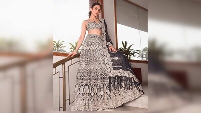 Rakul Preet's navy blue lehenga set is from the clothing house of designer Seema Gujral. (Instagram/@rakulpreet) Rakul Preet's navy blue lehenga set is from the clothing house of designer Seema Gujral. (Instagram/@rakulpreet)
