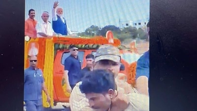 The youth was detained by cops before he could come close to PM Modi's vehicle. (Twitter/ANI) The youth was detained by cops before he could come close to PM Modi's vehicle. (Twitter/ANI)