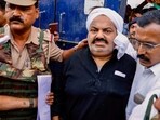 Prayagraj Police with jailed-mafia Atiq Ahmed outside Sabarmati Central Jail as he is being shifted to Prayagraj, in Ahmedabad, on Sunday, Prayagraj Police with jailed-mafia Atiq Ahmed outside Sabarmati Central Jail as he is being shifted to Prayagraj, in Ahmedabad, on Sunday,
