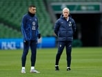 France coach Didier Deschamps and Kylian Mbappe during training 