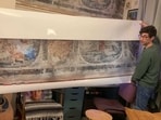 Luke Budworth has covered the paintings back up with in order to preserve them.