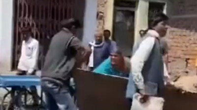A video went viral on social media of an elderly woman running half-naked pleading with the officials not to take her household items (Twitter/videoscreengrab) A video went viral on social media of an elderly woman running half-naked pleading with the officials not to take her household items (Twitter/videoscreengrab)