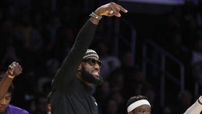 Los Angeles Lakers forward LeBron James, center, center Mo Bamba, left, and guard Dennis Schroder, right, contest a call during the first half of the team's NBA basketball game against the Orlando Magic on Sunday, March 19, 2023, in Los Angeles. (AP Photo/Marcio Jose Sanchez) (AP) Los Angeles Lakers forward LeBron James, center, center Mo Bamba, left, and guard Dennis Schroder, right, contest a call during the first half of the team's NBA basketball game against the Orlando Magic on Sunday, March 19, 2023, in Los Angeles. (AP Photo/Marcio Jose Sanchez) (AP)