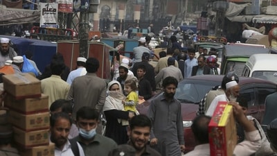 People visit a market to buy grocery and other stuff, in Peshawar. (AP) People visit a market to buy grocery and other stuff, in Peshawar. (AP)