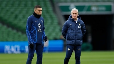 France coach Didier Deschamps and Kylian Mbappe during training (REUTERS)