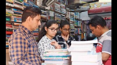 Students at a stationery store in Ludhiana on Sunday. (Gurpreet Singh/HT) Students at a stationery store in Ludhiana on Sunday. (Gurpreet Singh/HT)