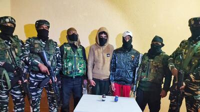 The militant associates in the custody of security forces in Bandipora on Saturday. (ANI)