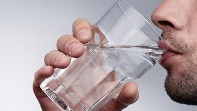 2. Drink a glass of water: Drinking water first thing in the morning can help hydrate your body and improve digestion. (Shutterstock)