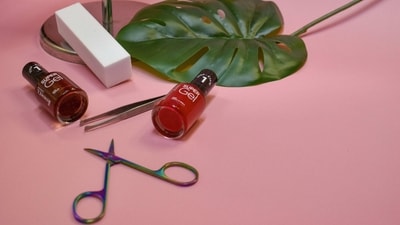 Gather Your Supplies: Before starting your at-home manicure, make sure you have all the necessary supplies. This includes a nail file, cuticle pusher, cuticle remover, nail buffer, nail polish remover, cotton pads, base coat, nail polish, and topcoat. (Unsplash) Gather Your Supplies: Before starting your at-home manicure, make sure you have all the necessary supplies. This includes a nail file, cuticle pusher, cuticle remover, nail buffer, nail polish remover, cotton pads, base coat, nail polish, and topcoat. (Unsplash)