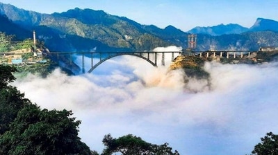 The Chenab railway bridge lies between Bakkal and Kauri in the Reasi district. (Twitter) The Chenab railway bridge lies between Bakkal and Kauri in the Reasi district. (Twitter)