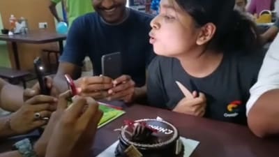 The image, taken from the viral video, shows the woman ‘blowing out’ camera flashes. (Instagram/@roam_packer) The image, taken from the viral video, shows the woman ‘blowing out’ camera flashes. (Instagram/@roam_packer)