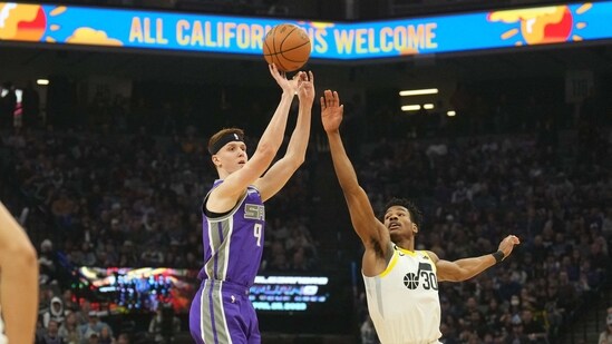 Sacramento Kings guard Kevin Huerter (9) shoots against Utah Jazz guard Ochai Agbaji (30) during the first quarter at Golden 1 Center.(USA TODAY Sports)