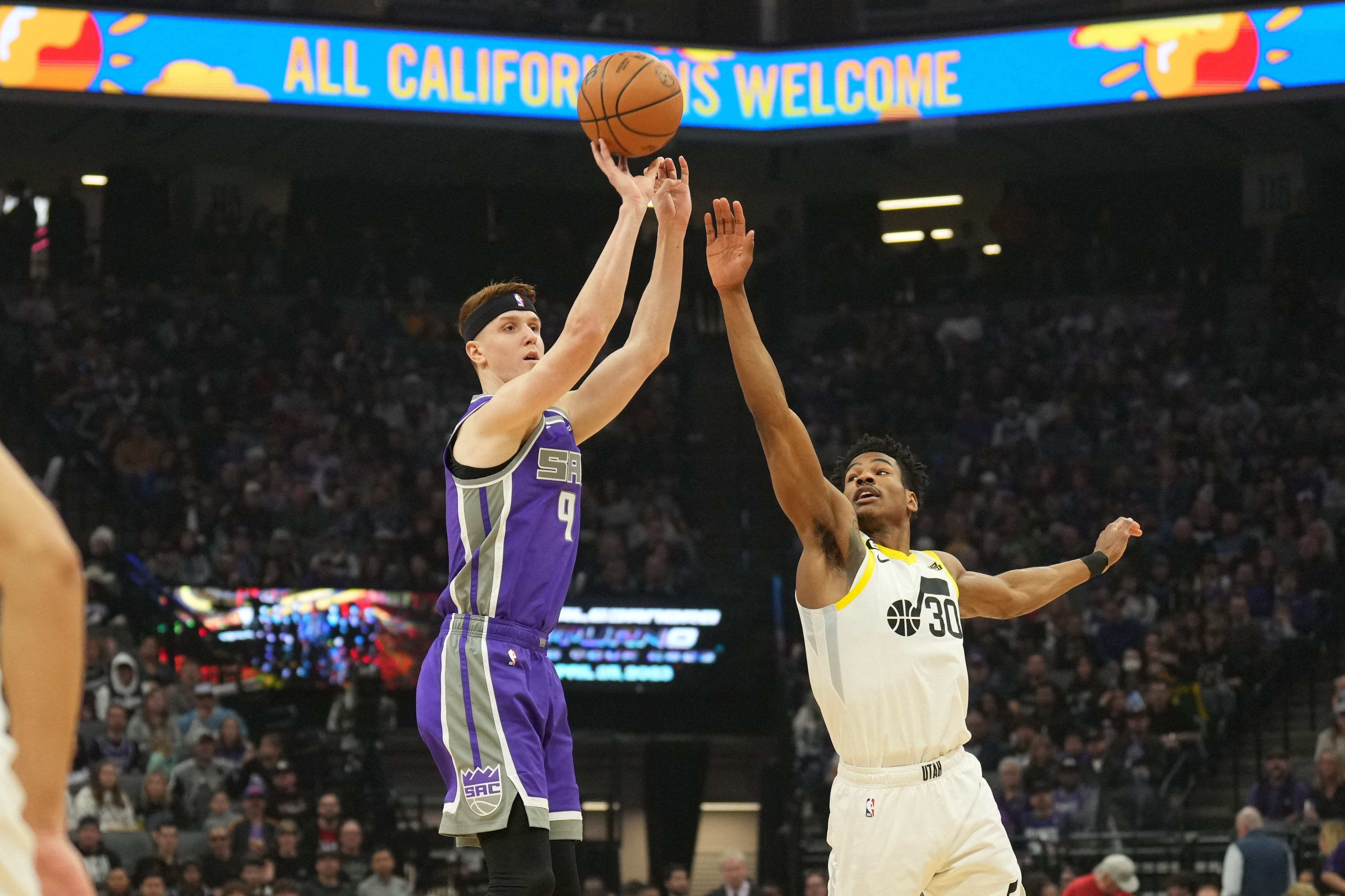 Sacramento Kings guard Kevin Huerter (9) shoots against Utah Jazz guard Ochai Agbaji (30) during the first quarter at Golden 1 Center. (USA TODAY Sports)