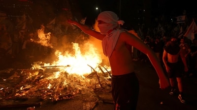 The unrest in Israel has been sparked by Justice Minister Yariv Levin’s proposals to shake up the judiciary by severely curbing the High Court of Justice’s judicial review powers. The overhaul, driven by Netanyahu, who is on trial for corruption, and his allies in Israel's most right-wing government ever, has plunged Israel into one of its worst domestic crises, AP reported. (Nir Elias / REUTERS) The unrest in Israel has been sparked by Justice Minister Yariv Levin’s proposals to shake up the judiciary by severely curbing the High Court of Justice’s judicial review powers. The overhaul, driven by Netanyahu, who is on trial for corruption, and his allies in Israel's most right-wing government ever, has plunged Israel into one of its worst domestic crises, AP reported. (Nir Elias / REUTERS)