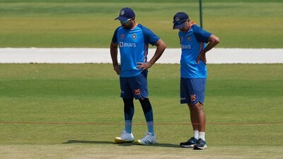 Indian captain Rohit Sharma, left, and coach Rahul Dravid look at the pitch during a practice session (AP) Indian captain Rohit Sharma, left, and coach Rahul Dravid look at the pitch during a practice session (AP)