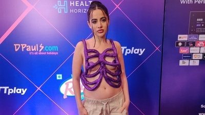 Uorfi Javed wears a structured rib cage-inspired glittery top and baggy pants set at the OTTPlay Changemakers Awards. (HT Photo/Varinder Chawla) Uorfi Javed wears a structured rib cage-inspired glittery top and baggy pants set at the OTTPlay Changemakers Awards. (HT Photo/Varinder Chawla)