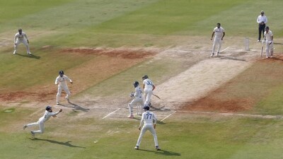 India's Virat Kohli, left, dives to stop a ball during the third day of third cricket test match between India and Australia in Indore (AP) India's Virat Kohli, left, dives to stop a ball during the third day of third cricket test match between India and Australia in Indore (AP)