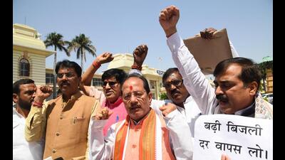 Leader of Opposition Vijay Kumar Sinha with BJP legislators protest outside the Bihar Assembly on Monday. (Santosh Kumar/HT Photo) Leader of Opposition Vijay Kumar Sinha with BJP legislators protest outside the Bihar Assembly on Monday. (Santosh Kumar/HT Photo)