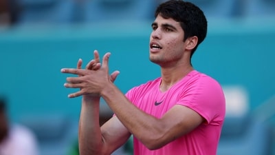 Carlos Alcaraz of Spain celebrates to the crowd after his straight sets victory against Dusan Lajovic (Getty Images via AFP) Carlos Alcaraz of Spain celebrates to the crowd after his straight sets victory against Dusan Lajovic (Getty Images via AFP)