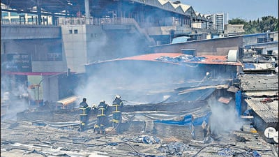 Mumbai, India - March 27, 2023: Firefighters at the site after a fire broke out in a hardware shop, in which at least two people were killed, near Sakinaka Metro Station at Andheri, in Mumbai, India, on Monday, March 27, 2023. (Photo by Vijay Bate/HT Photo) (HT PHOTO) Mumbai, India - March 27, 2023: Firefighters at the site after a fire broke out in a hardware shop, in which at least two people were killed, near Sakinaka Metro Station at Andheri, in Mumbai, India, on Monday, March 27, 2023. (Photo by Vijay Bate/HT Photo) (HT PHOTO)