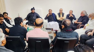 Opposition MPs wear black to protest Congress leader Rahul Gandhi's disqualification and attend a meeting at Leader of Opposition Mallikarjun Kharge's chamber in Parliament House in New Delhi, Monday, March 27, 2023. (PTI Photo) Opposition MPs wear black to protest Congress leader Rahul Gandhi's disqualification and attend a meeting at Leader of Opposition Mallikarjun Kharge's chamber in Parliament House in New Delhi, Monday, March 27, 2023. (PTI Photo)
