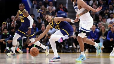 Golden State Warriors' Jordan Poole loses control of the ball against Minnesota Timberwolves' Kyle Anderson during the Warriors' 99-96 loss in an NBA basketball game at Chase Center in San Francisco, Sunday, (AP) Golden State Warriors' Jordan Poole loses control of the ball against Minnesota Timberwolves' Kyle Anderson during the Warriors' 99-96 loss in an NBA basketball game at Chase Center in San Francisco, Sunday, (AP)