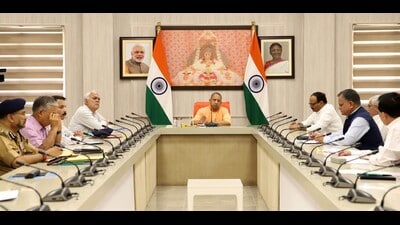 Yogi Adityanath reviewed Covid, influenza situation in the state at a high-level meeting on March 27. (HT photo) Yogi Adityanath reviewed Covid, influenza situation in the state at a high-level meeting on March 27. (HT photo)
