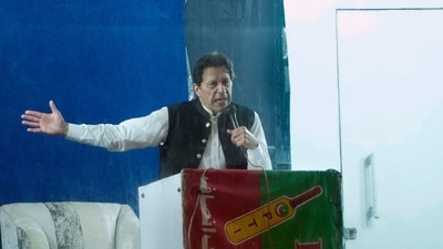 Protected by a bulletproof barrier, former Prime Minister Imran Khan speaks during a rally in Lahore, Pakistan, Sunday, (AP) Protected by a bulletproof barrier, former Prime Minister Imran Khan speaks during a rally in Lahore, Pakistan, Sunday, (AP)