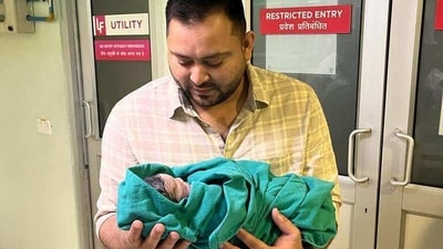 Tejashwi Yadav shared a picture with his first child. (Twitter) Tejashwi Yadav shared a picture with his first child. (Twitter)