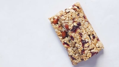 Snacks: Pack some energy bars, trail mix, or other snacks to keep you fueled up throughout the day. (Unsplash)