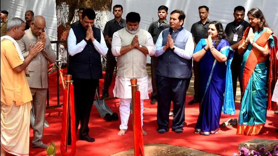 Navi Mumbai, India - March 27, 2023: Governor of Maharashtra Ramesh Bais with Dy. CM Devendra Fadnavis and ministers Uday Samant and Mangal Prabhat Lodha during the bhumi pujan of the main building of the newly created Maharashtra State Skills University and ITI in the campus of ITI, at Panvel, in Navi Mumbai, India, on Monday, March 27, 2023. (Photo by Bachchan Kumar/ HT PHOTO) (HT PHOTO)