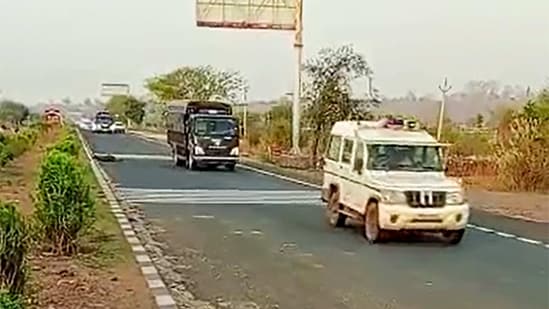 Prayagraj Police van carring jailed-mafia Atiq Ahmed from Sabarmati Central Jail on its way to Prayagraj, in Shivpuri, Monday, March 27, 2023. (PTI)