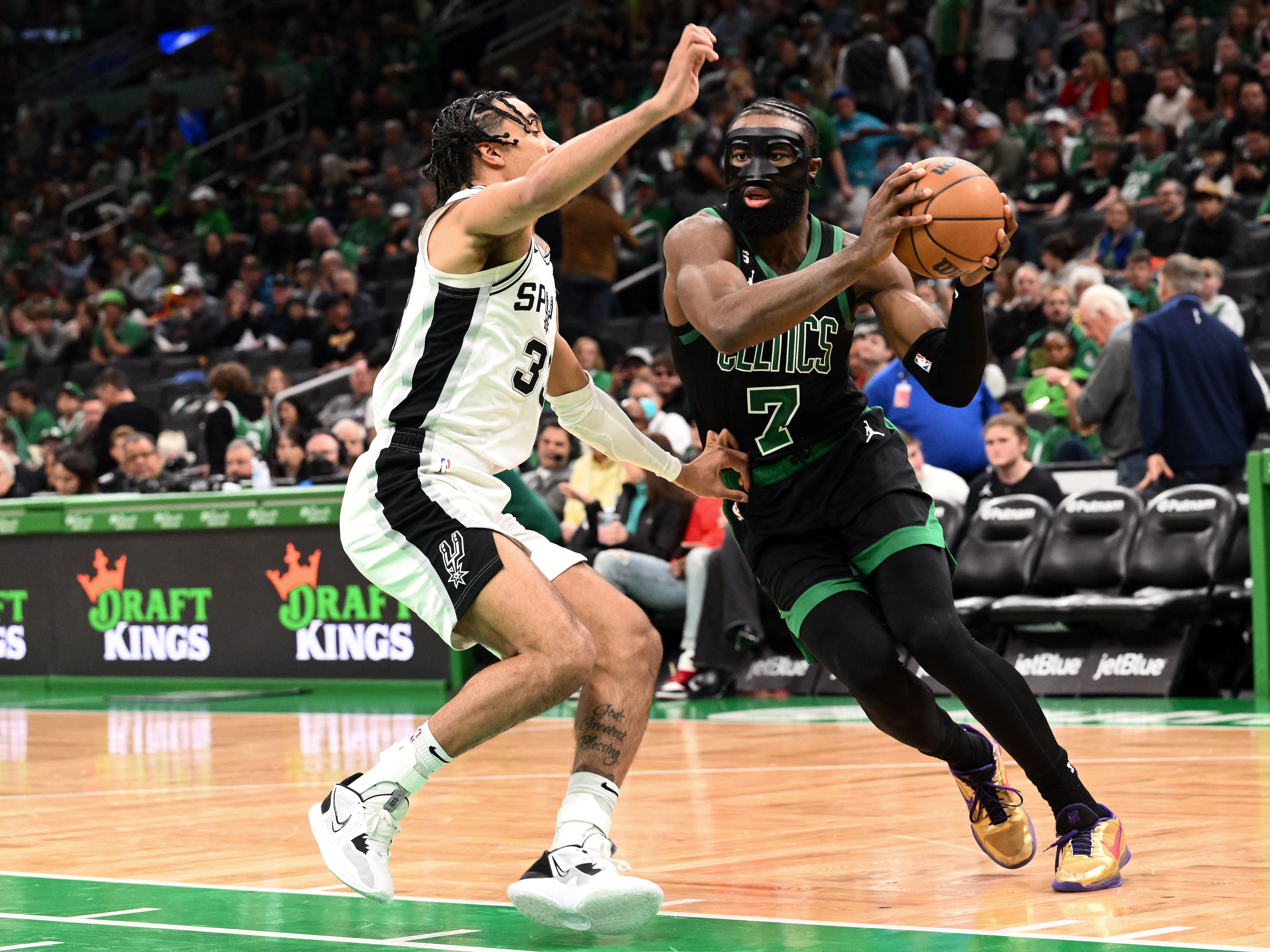 Boston Celtics guard Jaylen Brown (7) drives to the basket against San Antonio Spurs guard Tre Jones (33) during the third quarter at the TD Garden. (USA TODAY Sports)