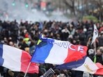 Flags are seen during a demonstration as part of the tenth day of nationwide strikes and protests against French government's pension reform in Paris, France.