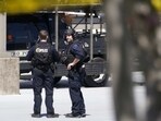 Nashville School Shooting: Metro Nashville Police officers gather near The Covenant School, a private Christian school in Nashville. Nashville School Shooting: Metro Nashville Police officers gather near The Covenant School, a private Christian school in Nashville.