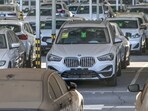 Newly-produced cars at a BMW factory in Shenyang in China. (AFP)