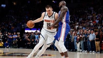 Denver Nuggets center Nikola Jokic (15) drives to the basket against Philadelphia 76ers center Dewayne Dedmon (14) in the first quarter at Ball Arena. Mandatory Credit: Isaiah J. Downing- (USA TODAY Sports)