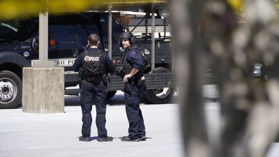 Nashville School Shooting: Metro Nashville Police officers gather near The Covenant School, a private Christian school in Nashville, Tenn., following a deadly shooting. (AP) Nashville School Shooting: Metro Nashville Police officers gather near The Covenant School, a private Christian school in Nashville, Tenn., following a deadly shooting. (AP)