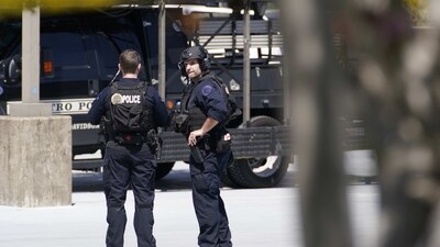 Nashville School Shooting: Metro Nashville Police officers gather near The Covenant School, a private Christian school in Nashville. (AP)