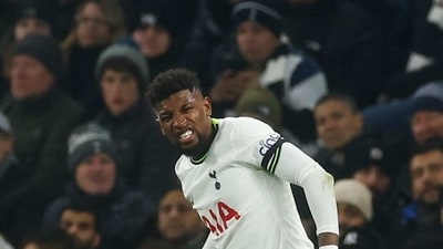 Soccer Football - Champions League - Round of 16 - Second Leg - Tottenham Hotspur v AC Milan - Tottenham Hotspur Stadium, London, Britain - March 8, 2023  Tottenham Hotspur's Emerson Royal receives medical attention Action Images via Reuters/Paul Childs (Action Images via Reuters)